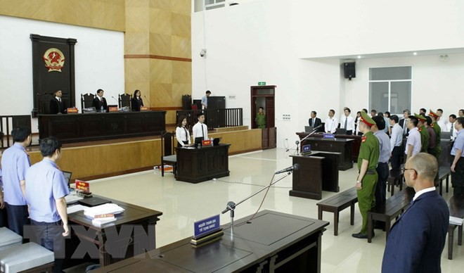 [Photo] Tòa án Hà Nội xét xử phúc thẩm bị cáo Đinh La Thăng - Ảnh 1.
