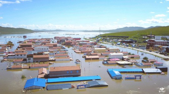 Lũ lụt Trung Quốc: Hàng chục người chết, thiệt hại 3,87 tỉ USD - Ảnh 2.
