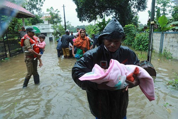 Những hình ảnh kinh hoàng về trận mưa lũ lịch sử khiến 164 người chết ở Ấn Độ - Ảnh 7.