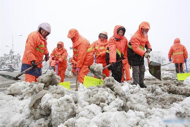 Việt Nam đón giá rét, Trung Quốc cũng gồng mình trước thời tiết lạnh kỷ lục trong lịch sử nước này - Ảnh 12.