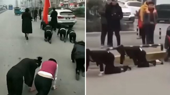 Cận Tết, công ty Trung Quốc phạt nhân viên bò trên đường vì không đạt chỉ tiêu - Ảnh 1.