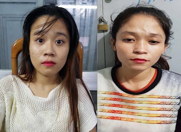 2 nữ quái móc trộm iPhone của người dừng chờ đèn đỏ ở Sài Gòn  - Ảnh 1.