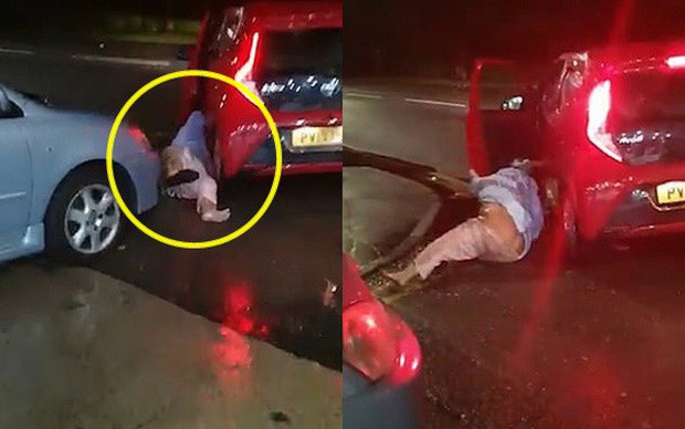 Cảnh tượng gây sốc khi người phụ nữ bị nam tài xế xe ô tô kéo lê trên đường trong cuộc tấn công tàn bạo - Ảnh 1.