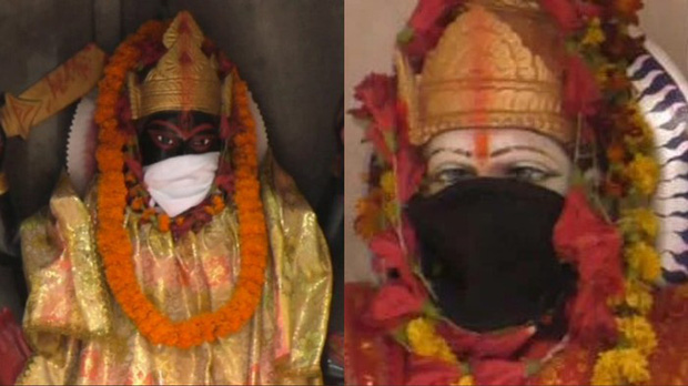 Người dân Ấn Độ đeo khẩu trang cho tượng thần để tránh không khí ô nhiễm - Ảnh 1.