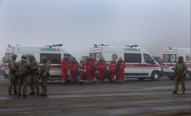 Ukraine và lực lượng thân Nga trao đổi 147 tù nhân - Ảnh 4.