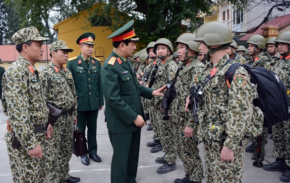 Thượng tướng Phan Văn Giang kiểm tra các đơn vị quân đội tham gia bảo vệ Hội nghị thượng đỉnh Hoa Kỳ - Triều Tiên - Ảnh 1.