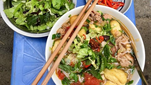 Báo nước ngoài gợi ý 5 món ăn đường phố Hà Nội ông Trump - Kim nên thưởng thức - Ảnh 1.