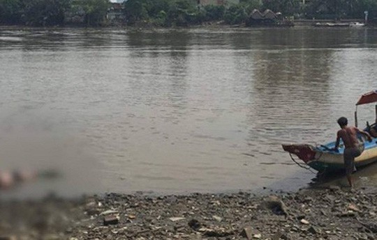 Tìm thấy thi thể cô gái bị thả xuống sông Thu Bồn - Ảnh 1.