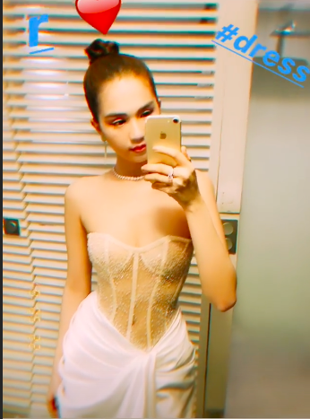 Sau bộ đầm có như không, Ngọc Trinh tái xuất táo bạo hơn, netizen bình luận: Trông giống bikini quấn khăn tắm - Ảnh 1.