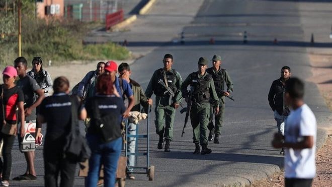 [ẢNH] Đấu súng dữ dội dọc biên giới Venezuela - Colombia - Ảnh 20.