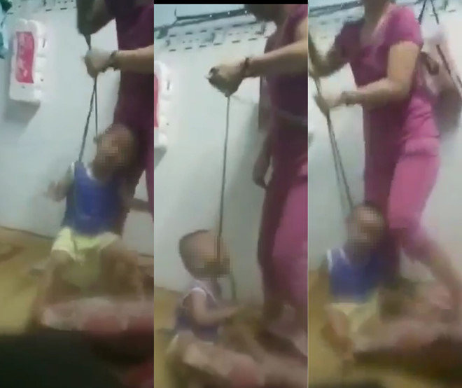 Đề nghị khởi tố người quay video cháu bé 4 tuổi bị mẹ buộc dây vào cổ, bạo hành dã man - Ảnh 1.