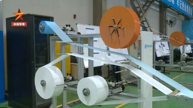 Trung Quốc áp dụng công nghệ chế tạo máy bay phản lực để sản xuất khẩu trang - Ảnh 4.