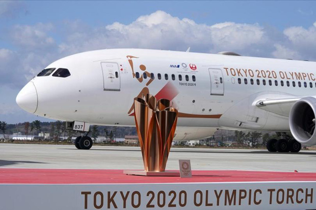Đuốc Olympic 2020 lặng lẽ đến Nhật Bản giữa những hoài nghi và lo ngại vì dịch Covid-19 - Ảnh 1.