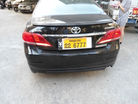 Phát hiện súng côn quay và đạn trên xe Camry biển số Lào 1