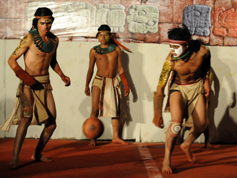 Honduras Maya Chorti and Guatemala´s Quirigua vie for the ball in Copan Ruinas, some 400 kms west of Tegucigalpa, on December 18, 2012.