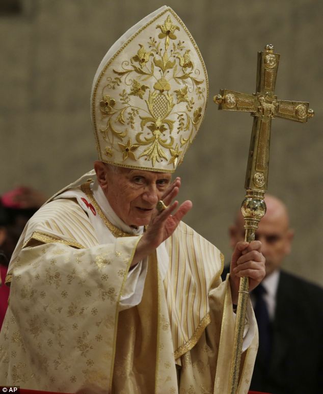 Heralded by the blare of trumpets reflecting Christmas joy, Pope Benedict XVI is presides over Christmas Eve Mass in St Peter's Basilica, packed with tourists, Romans and other faithful