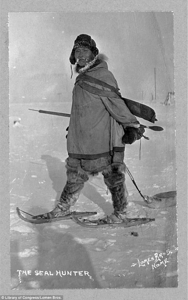 Hunter: A seal hunter is seen walking on land, his snow shoes helping him easily slide across the frozen land