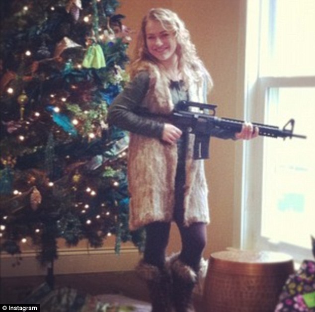 Striking a pose: 'Furs & guns, yes, it was a redneck Christmas,' said this Instagram user