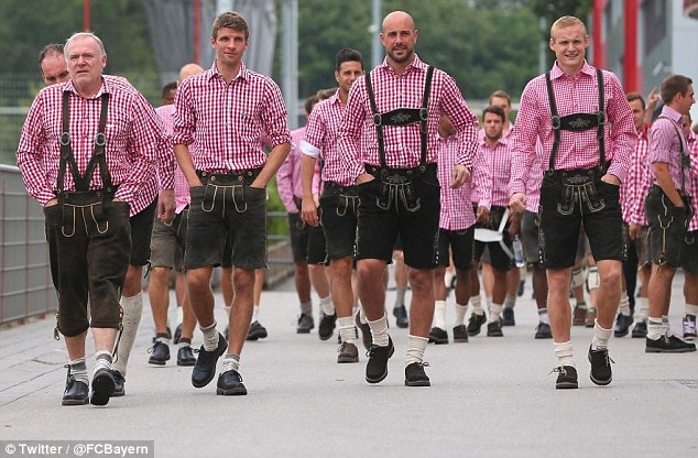 The Bayern Munich squad arrive at Oktoberfest in Munich after their 4-0 win on Saturday