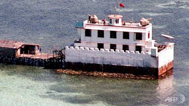 This aerial photograph 
taken in 1995 shows a Chinese concrete fort equipped with heavy guns on 
the rooftop, built by the Chinese in Johnson South Reef (also known as 
Chigua Reef or Mabini Reef) in Spratly Islands in the South China Sea.