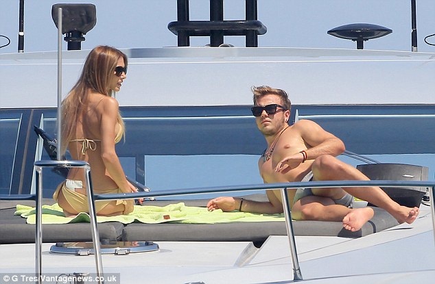 Winning: Germany World Cup winner Mario Gotze and his model girlfriend Ann-Kathrin Brommel relax