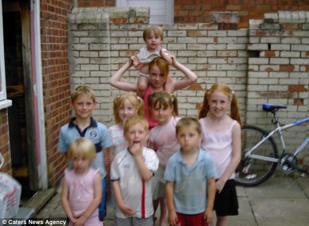 Athena pictured (centre right, with yellow hair ties) in a childhood photo with her brothers and sisters