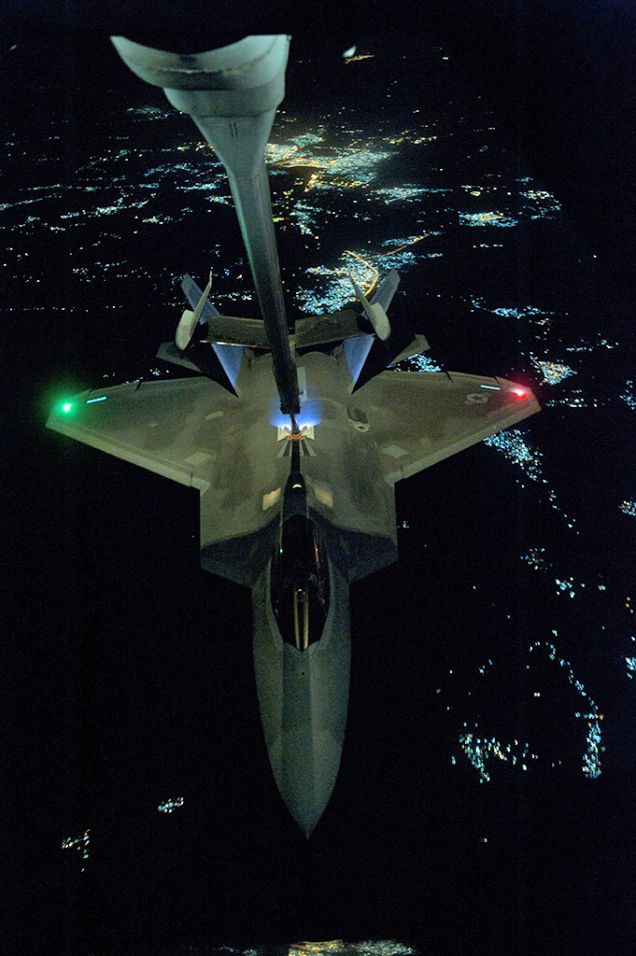 Cool photos of the F-22 refueling at night on its way to Syria