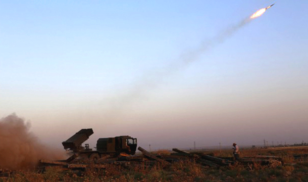 Peshmerga bắn đạn phản lực của trong trận đánh với quân ISIS giành thị trấn Celavle, tỉnh Diyala province, Iraq, ngày 24.8.