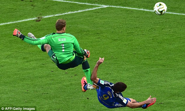 On the way down: Neuer and Higuain following their clash in the second half