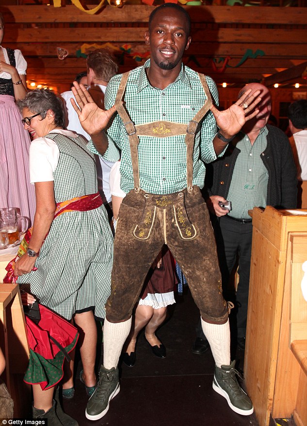 Usain swapped his Lycra for a Lederhosen which he teamed with a pair of olive green trainers