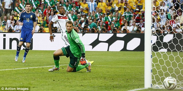 Agonising: Messi (left) watches as the ball rolls just wide of Neuers far post