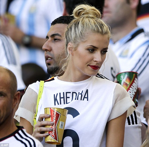 Concerned: Khediras girlfriend Gercke was unable to watch her man in action because of injury