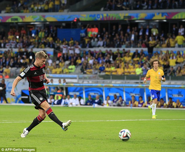 Battered: Kroos scored twice against Brazil as Germany crushed the hosts