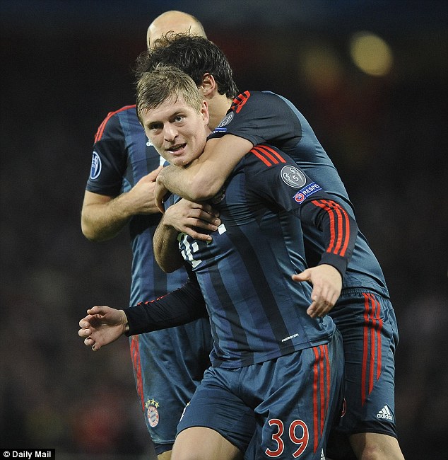 Gunned down: Kroos celebrates after his superb goal against Arsenal in the Champions League last season