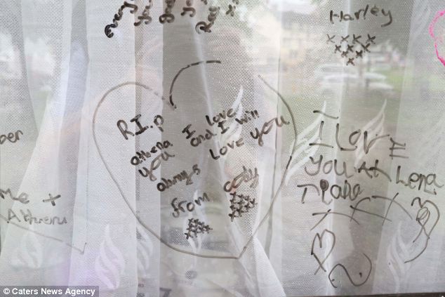 Athenas grieving friends have written tribute messages to her on the windows of her family home in Leicester