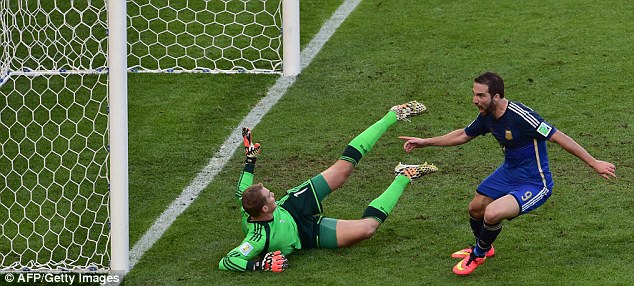 Ecstasy: Higuain (right) runs off to celebrate - but his joy was short-lived