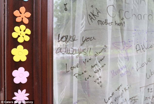 Athenas grieving friends have written tributes to her on the windows of her family home in Leicester
