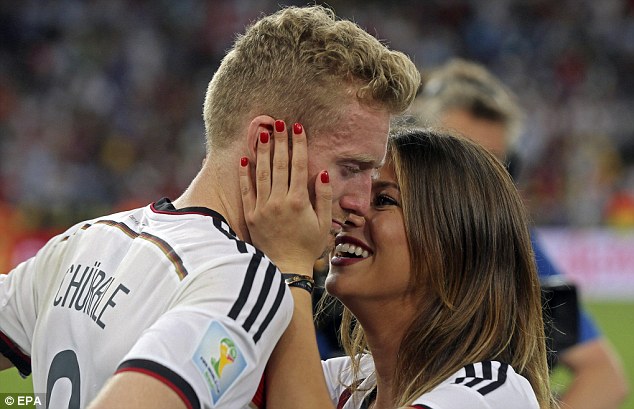 Happy: Schurrle and Yorke took to the pitch to celebrate their World Cup triumph over Argentina