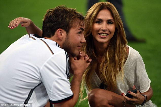 Unbelievable: Gotze and his partner celebrate after winning the World Cup at the Maracana stadium in Rio