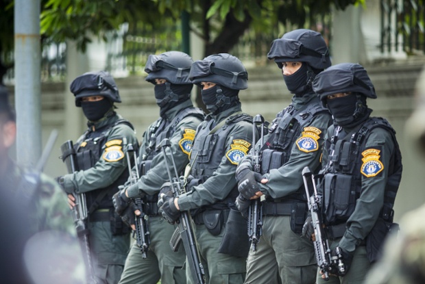 Lính biệt kích của quân đội Thái Lan làm nhiệm vụ trên đường phố ở Bangkok, sau khi quân đội thực hiện đảo chính vào ngày 22/5.