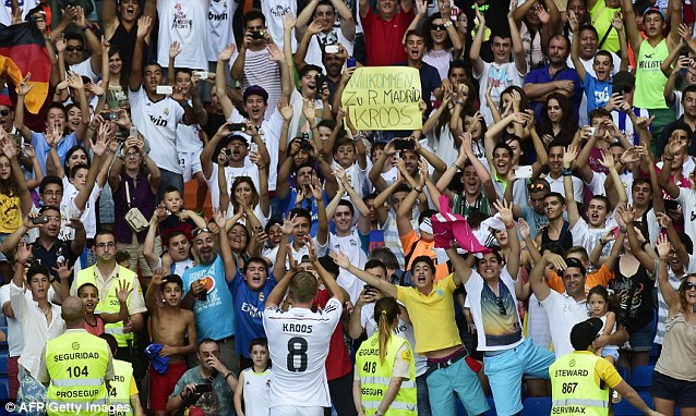 Superstar: The World Cup-winning midfielder enjoys the adulation of Real Madrids fans