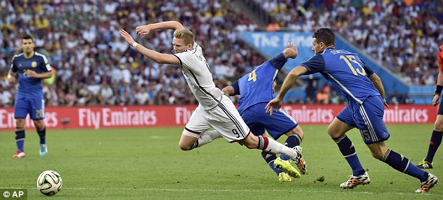 Throwing himself: Schurrle goes to ground in the Argentina area but no penalty is awarded
