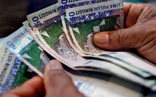 Ngày 20/8, đồng Ringgit của Malaysia giảm giá xuống mức thấp nhất trong 17 năm.