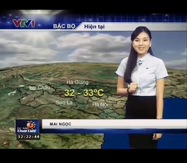 Hình ảnh xinh đẹp, đáng yêu của Mai Ngọc khi đưa tin thời tiết trực tiếp trên truyền hình Việt Nam.