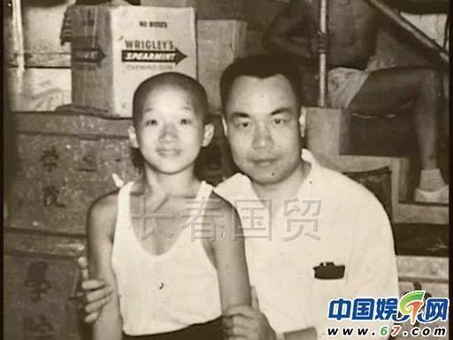 Jackie Chan as a child and his father.