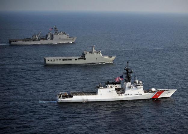 The Legend-class national security cutter USCGC Waesche (WMSL-751), Indonesian Navy landing platform dock ship KRI Banda Aceh (BAC 593) and the amphibious dock landing ship USS Germantown (LSD 42) steam through the Java Sea in 2012. US Navy Photo