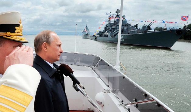 Russian President Vladimir Putin, second left, reviews a Navy parade in Baltiisk, western Russia, Sunday, July  26, 2015 during celebrations for Russian Navy Day. (Mikhail Klimentyev/RIA-Novosti, Kremlin Pool Photo via AP) Photo: Mikhail Klimentyev, AP / POOL RIA NOVOSTI KREMLIN