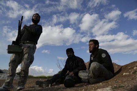 
Một số thành viên phe nổi dậy Jund al-Aqsa ở Syria. Ảnh: AFP
