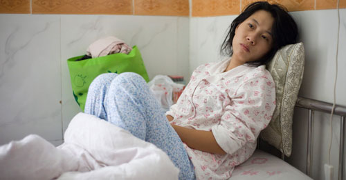 
Cô Phùng Kiến Mai bị buộc phải phá thai khi đang ở tháng thứ 7 Ảnh: THE NEW YORK TIMES
