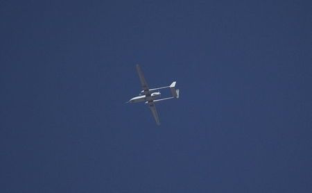 Một UAV giám sát của Israel bay trên TP Hebron - Pakistan ở Bờ Tây tháng 6-2014. Ảnh: Reuters